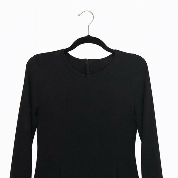 The Limited Size 4 Black Long-Sleeved Black Dress with Pleated Bottom. - Picture 2 of 2